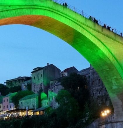 Mostar Old Bridge illuminated with the colors of Flower of Srebrenica